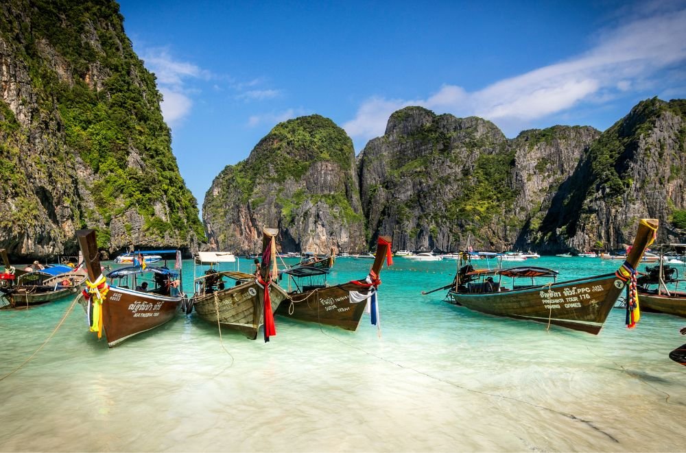 Lung boast on the coast of Koh Phi Phi