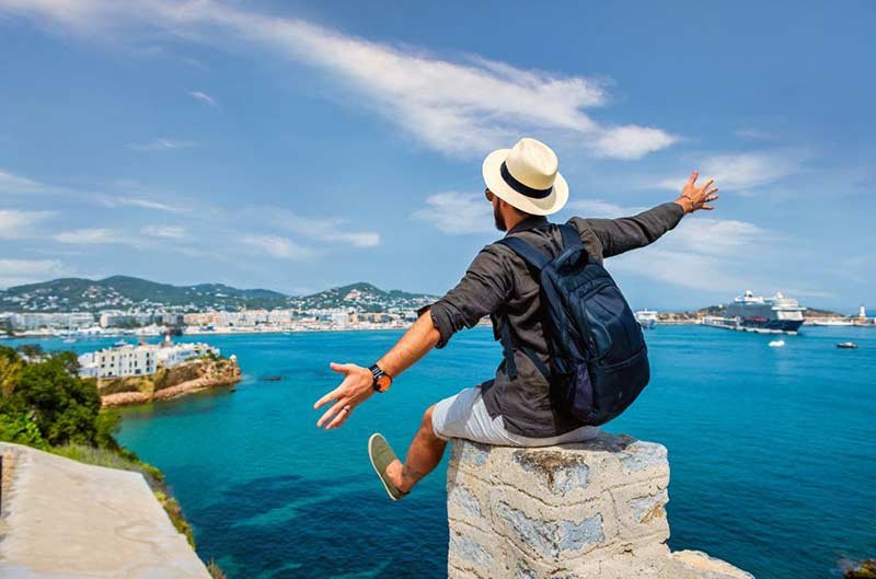 men happy to see the turquoise sea