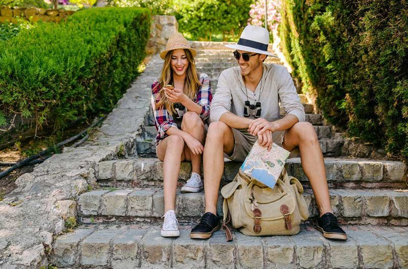 couple seating on stairs